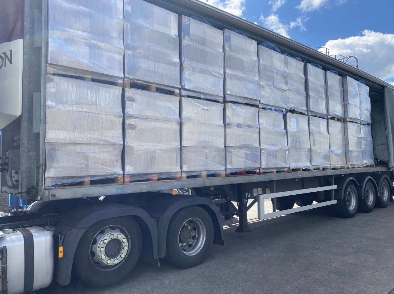 Double-stacked palletised freight ready for delivery